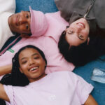 Pharrell Williams Collaborates with Evian for Tennis-Inspired Apparel