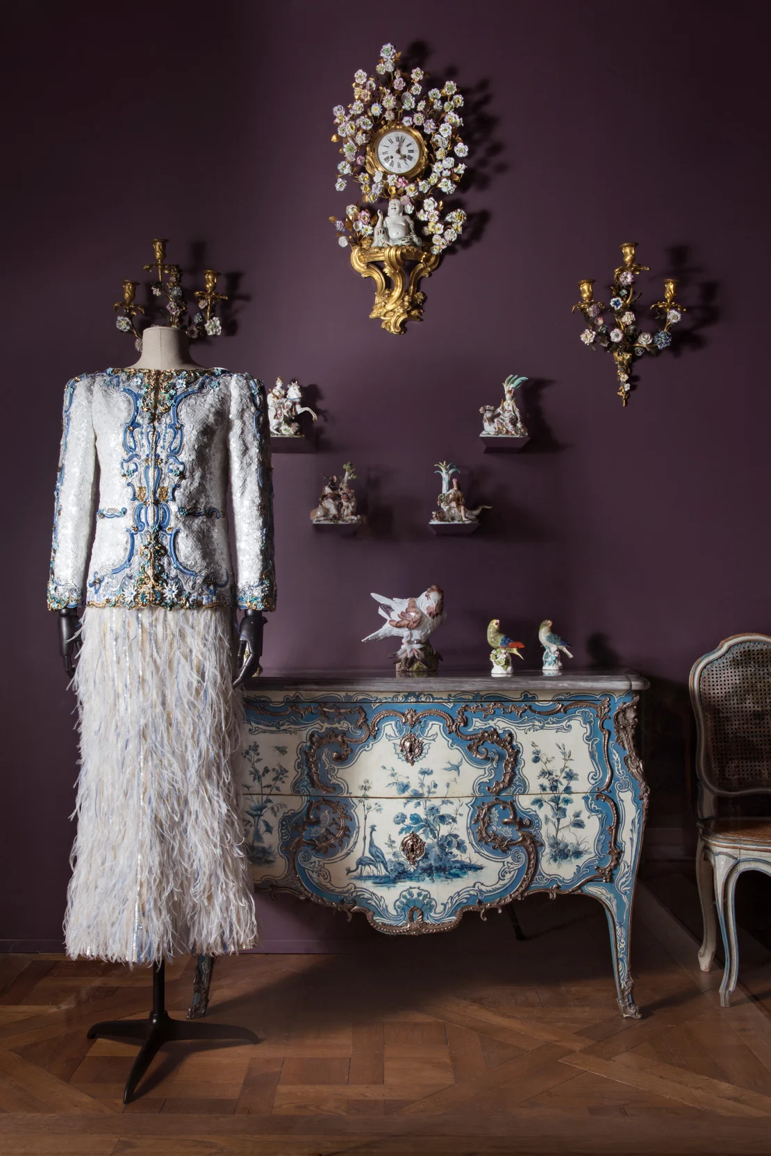 Karl Lagerfeld drew inspiration from an ornate blue and white cabinet. Image source: Nicolas Matheus/Musée du Louvre via CNN