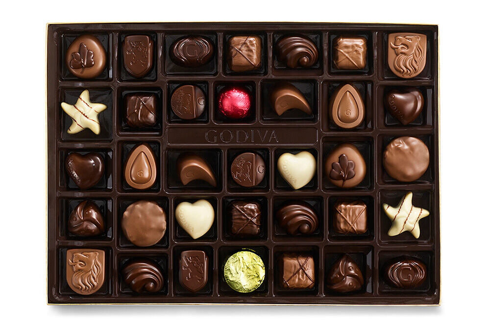 Assorted Chocolate Gold Gift Box, Red Ribbon, 36 pc. Image source: GODIVA Chocolatier