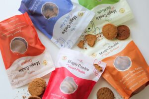 PawCo Magic Cookies in five functional flavors: Gut Health, Heart Health, Hip & Joint, Skin & Coat, and Original. Crafted with clean, plant-based ingredients for healthier, happier dogs. Image source: PawCo